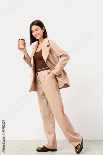 Happy fashionable young wom...