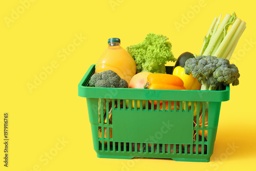 Green shopping basket with ...