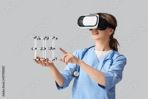 Female doctor in VR glasses...