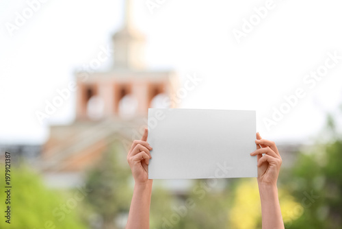 Female hands holding blank ...