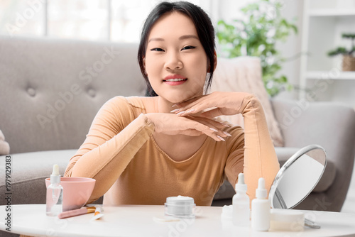 Beautiful young happy Asian...