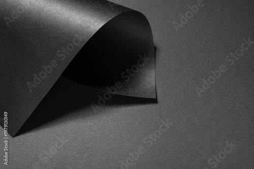 Black paper on dark backgro...