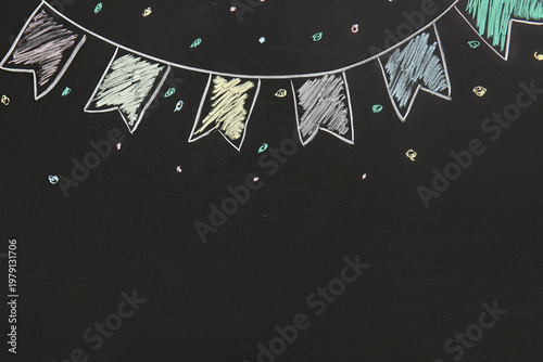 Drawn flags on black chalkb...