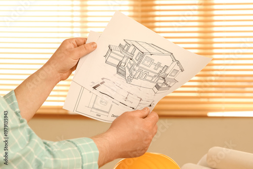 Hands of male constructor w...