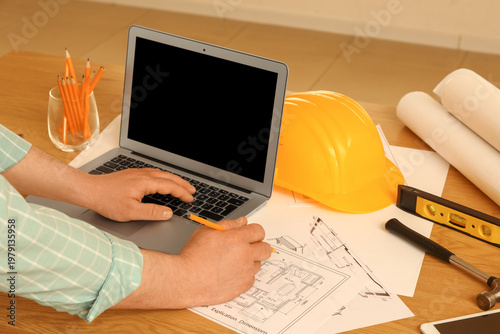 Hands of male constructor w...