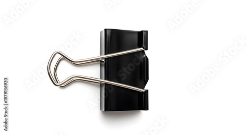 A silver paperclip attached to a black binder clip on a white background office supplies 1