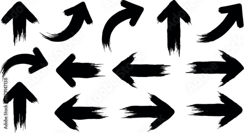 Collection of hand drawn black brushstroke arrows pointing in various directions isolated on white background
