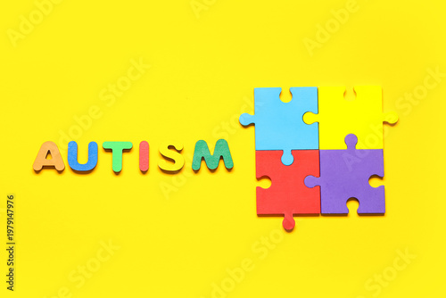 Word AUTISM with colorful p...