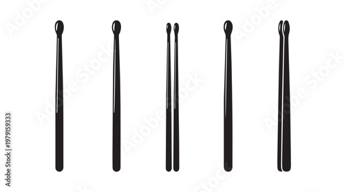 Drumsticks arranged in a row on a white background with varied sizes