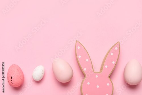 Wooden bunny ears with East...