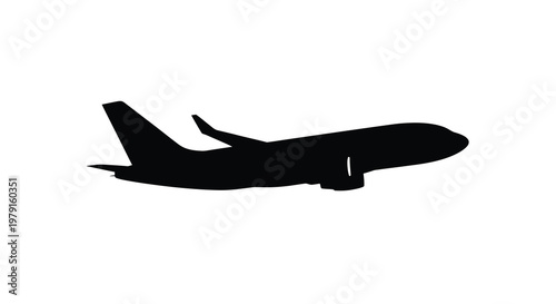 A dark airplane in flight against a white background silhouette
