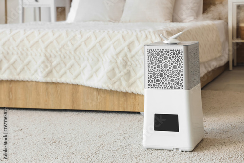 Modern air humidifier on ca...