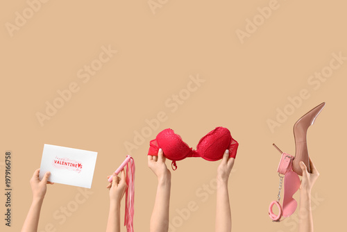 Female hands with sex toys,...