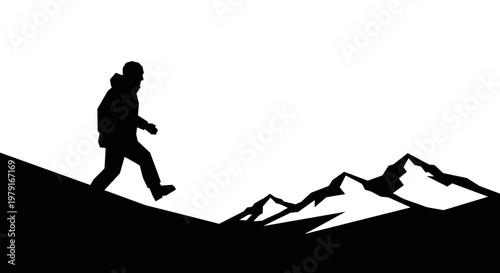 Man hiking on mountain peak.