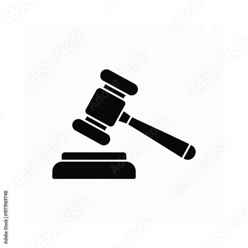A black silhouette of a gavel resting upon a soundblock
