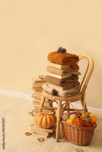 Chair with autumn pumpkins,...
