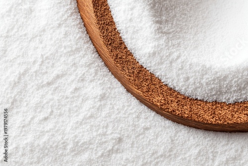 Detailed macro view of white fibrous coconut flesh with a partial brown shell edge, highlighting natural texture.