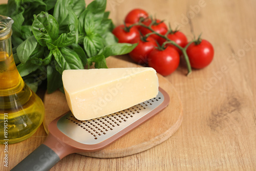 Cutting board with grater a...