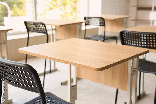 Empty desk in classroom, cl...