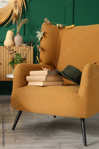 Books and hat with autumn l...