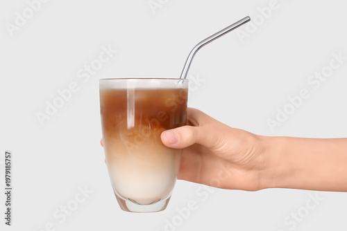 Female hand with glass of i...