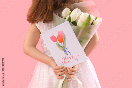Cute little girl with tulip...