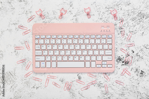 Stylish pink keyboard and c...