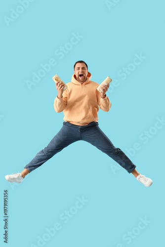 Jumping young man with tast...