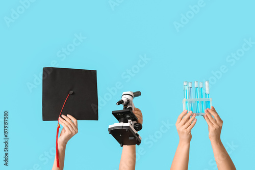Female hands holding micros...