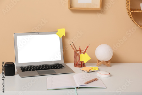 Notebook, laptop and sticky...