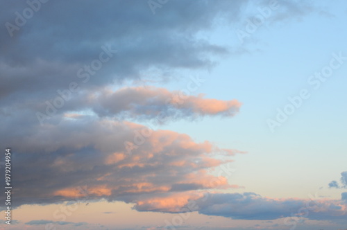 Pastel Clouds in a Blue Sky at Sunset