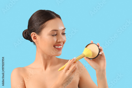 Young Asian woman with make...