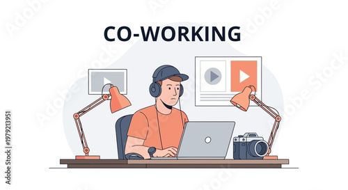 Young man working in a co-working space with laptop, camera, and lamps