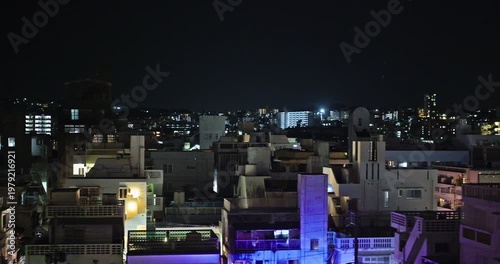 Vew from inside the car, a view of Japanese city at night