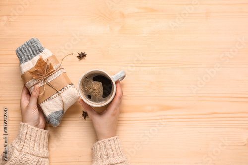 Woman with cup of coffee an...