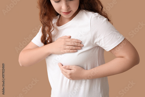 Young woman checking her br...