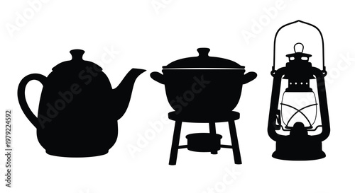 Antique teapot cooking pot and lantern in black silhouette