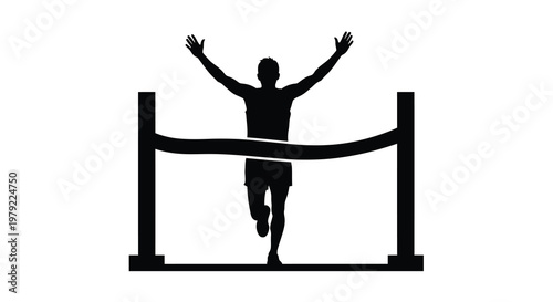 Runner crosses finish line with arms raised in victory silhouette