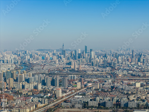 Aerial view of modern city with blue sky