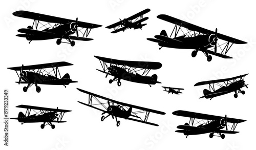 Decorative biplane silhouettes vector set in flat black style for aviation and retro designs