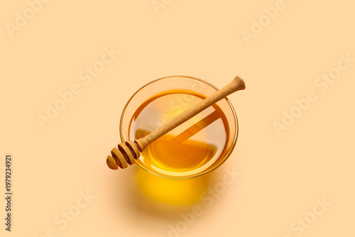 Glass bowl of sweet honey a...