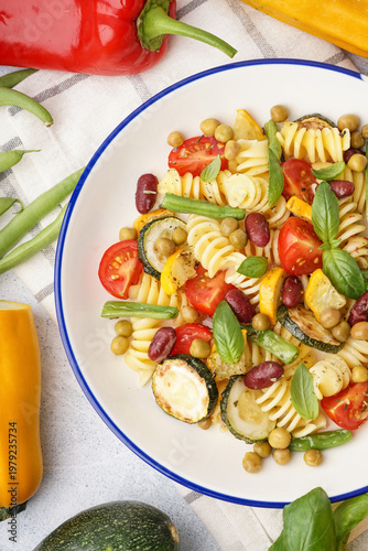 Bowl of tasty pasta salad w...