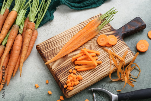 Fresh carrots and wooden bo...