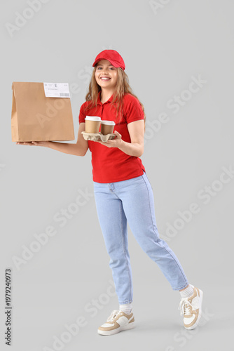Female courier with food on...