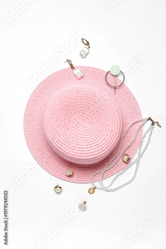Pink straw hat with jewelry...