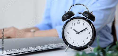 Alarm clock on table of bus...