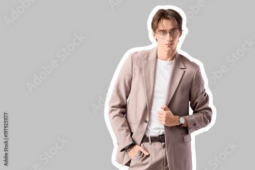 Fashionable young man in su...