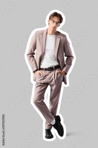 Stylish young man in suit o...