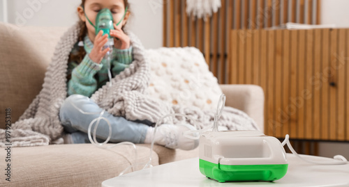 Nebulizer on table against ...
