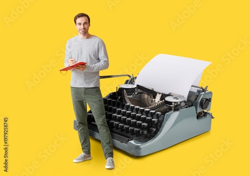 Young man with notebook and...